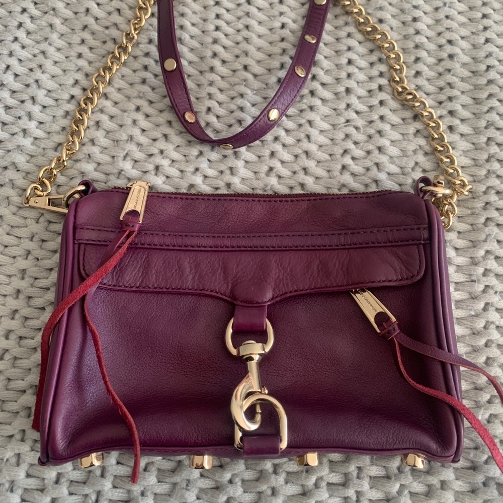 Rebecca Minkoff eggplant handbag with gold Hardware.